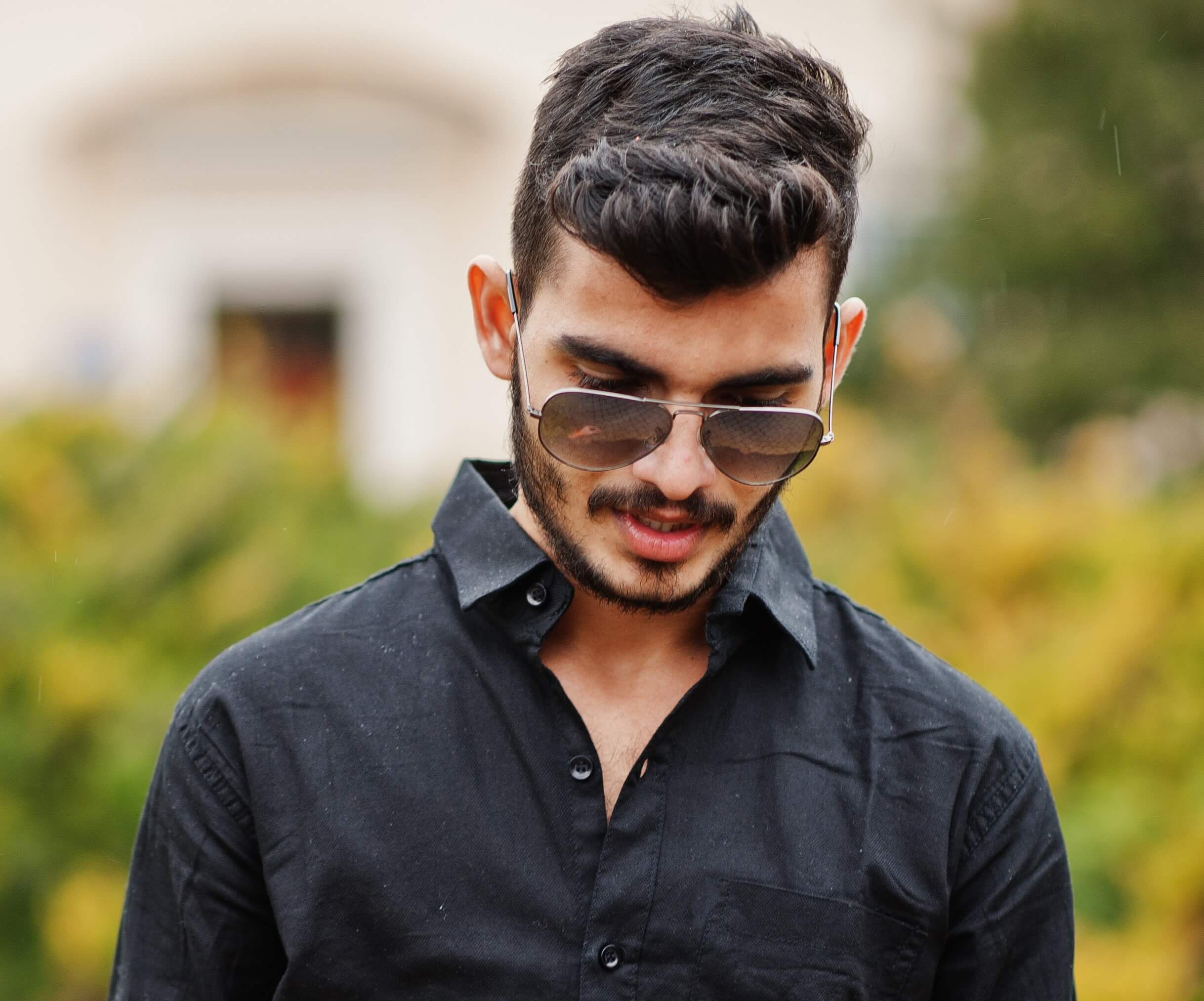 indianstylishmanblackshirtsunglassesposedoutdoor_gwmti_2437