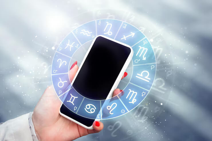 womanwithmobilephonereadingastrologicalforecastaboutzodiacsigns1019692800_a0mje_740
