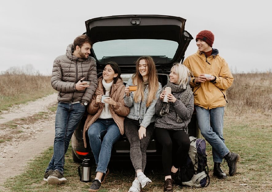 people enjoying car ride