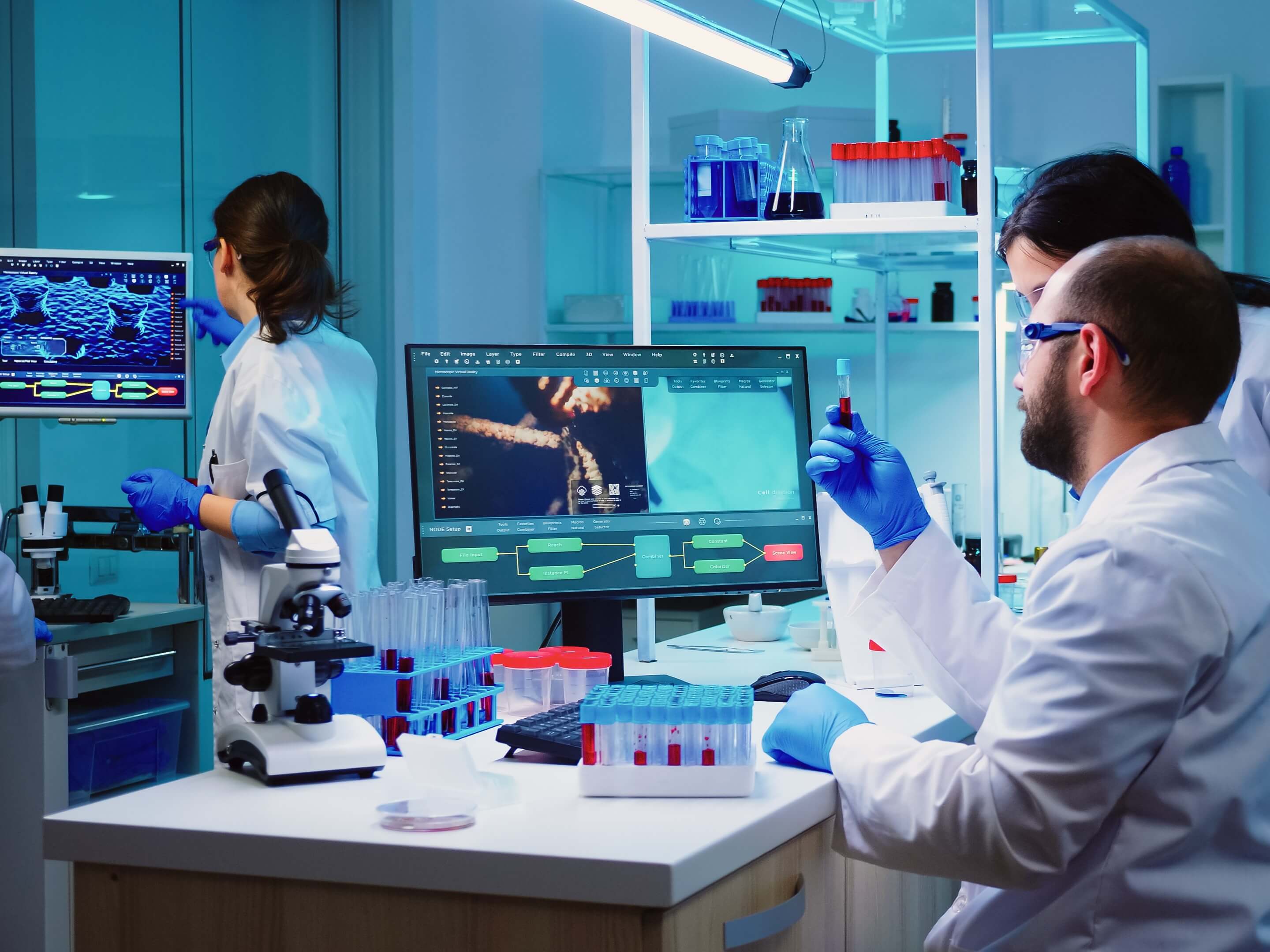 microbiologistdoctortakingbloodsampletubefromrackwithmachinesanalysislabbackground_mynjm_2880