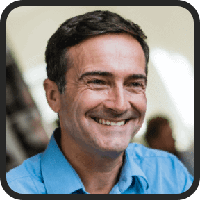 Smiling man portrait used as a customer testimonial photo on the Lotto Champ website.