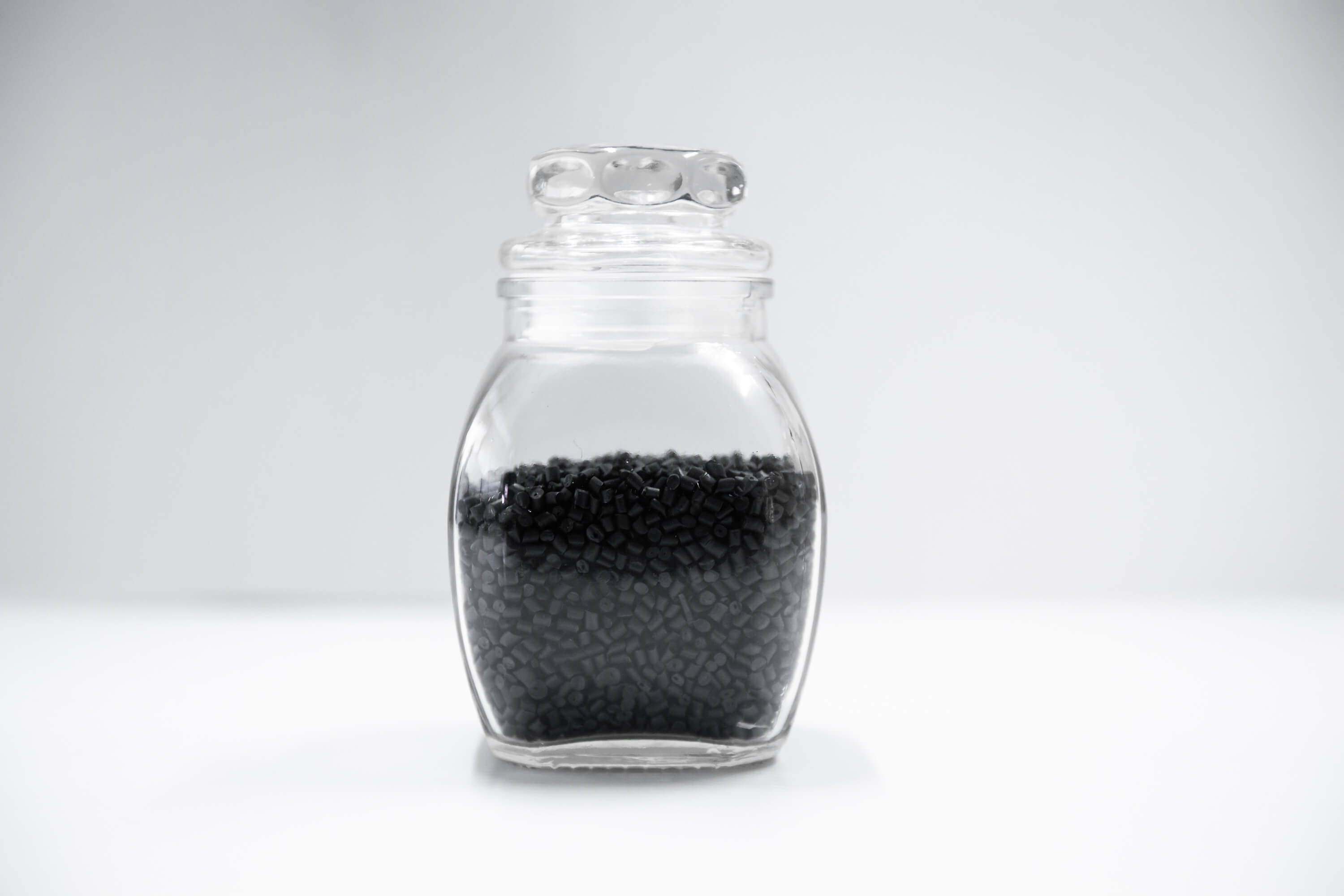 polypropylenegranulecloseupbackgroundtextureplasticresinmasterbatchgreychemicalgranulesindustrialplasticproduction_m4nda_3000