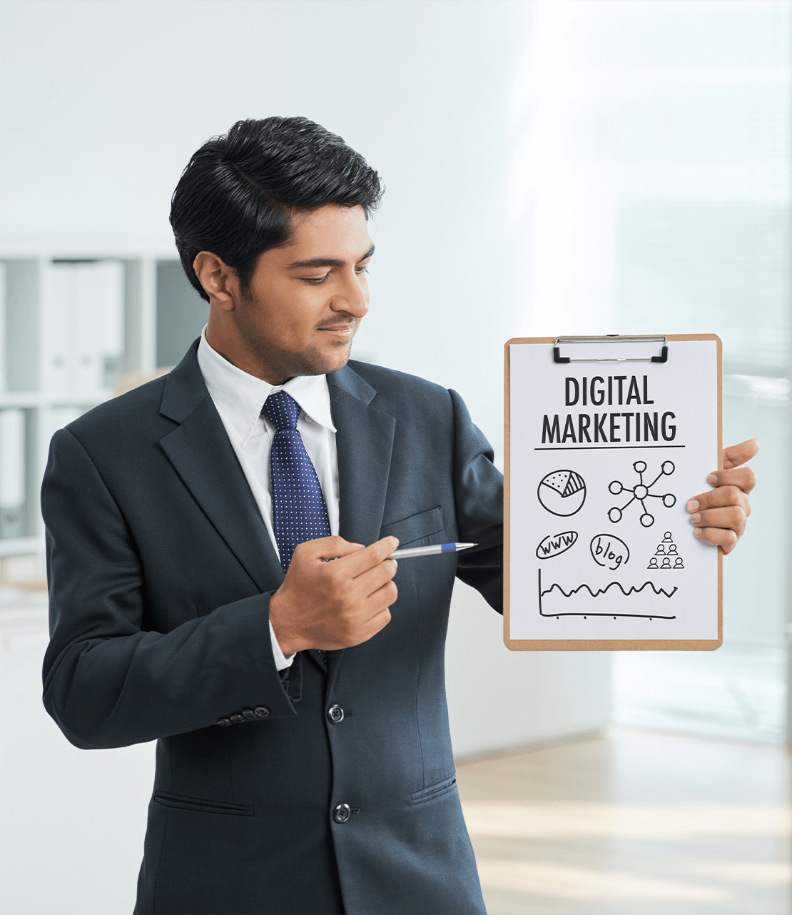 c4njm_1110_mansuitstandingofficewithclipboardpointingposterwithwords