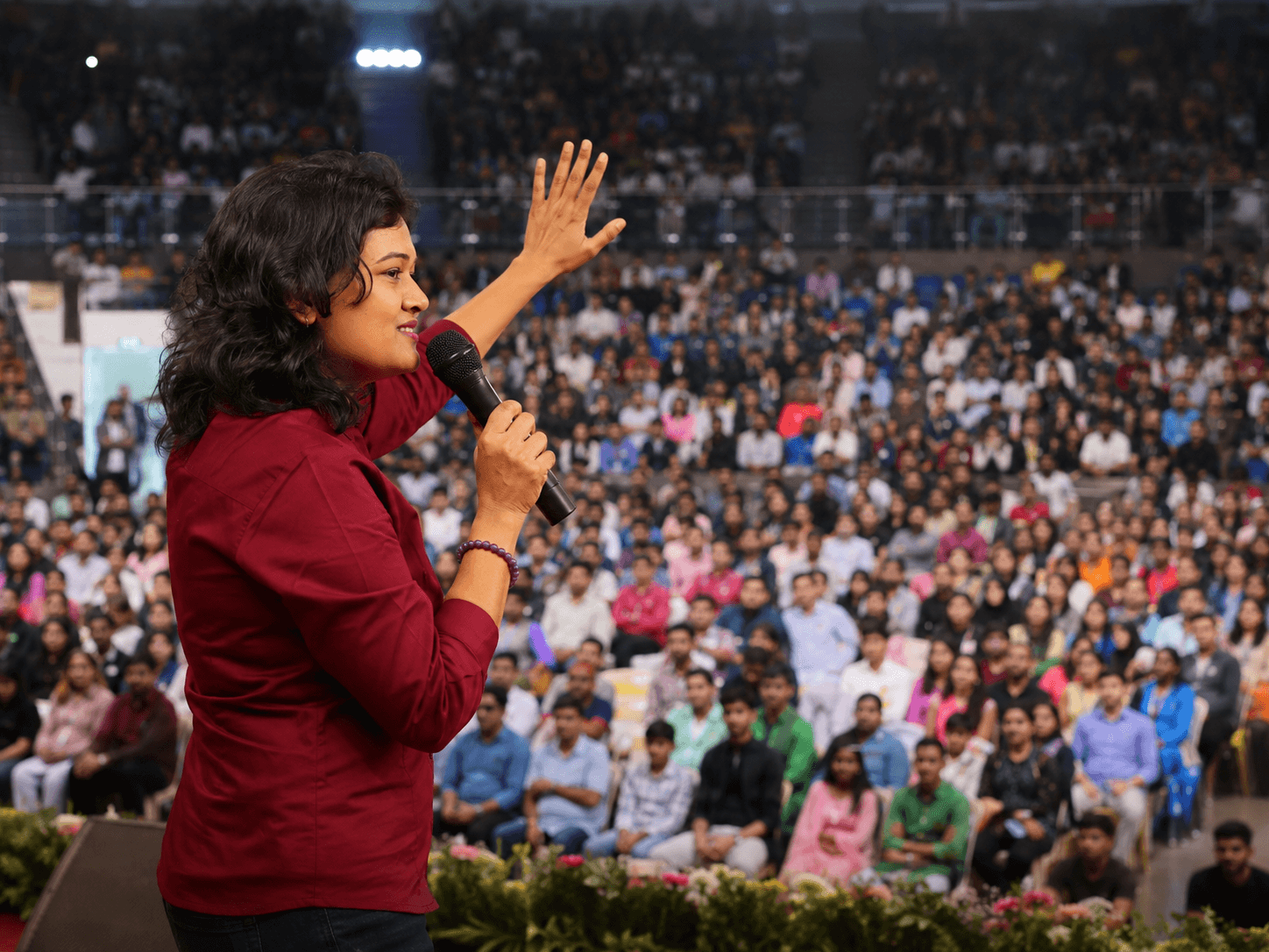 Coach Rashmi addressing an audience